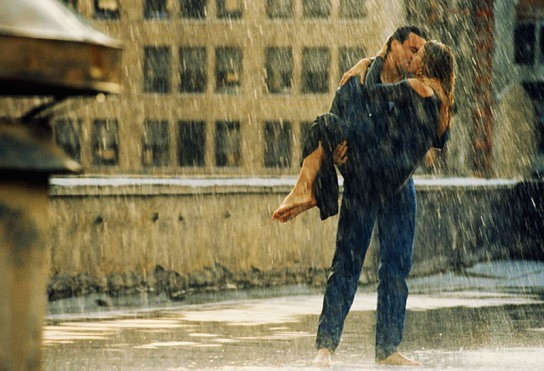 couple kissing in rain. Lovers kissing in rain