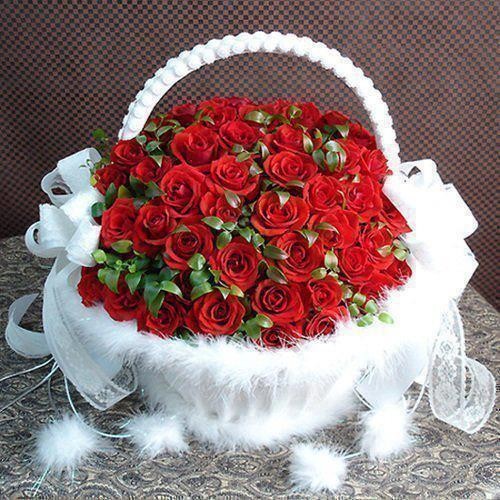 White Basket Of Red Roses