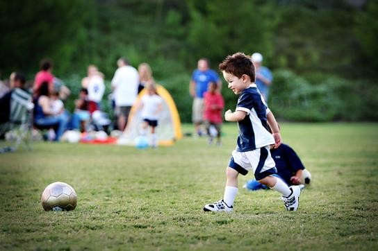 Boy playing football