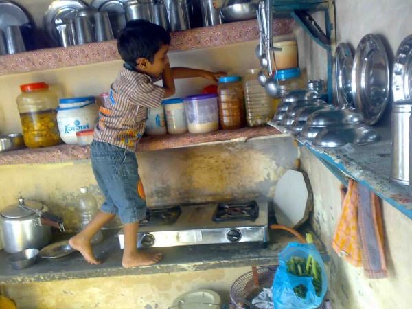 Little Boy In The Kitchen