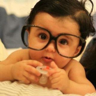 Cute Baby Wearing Huge Glass Frames
