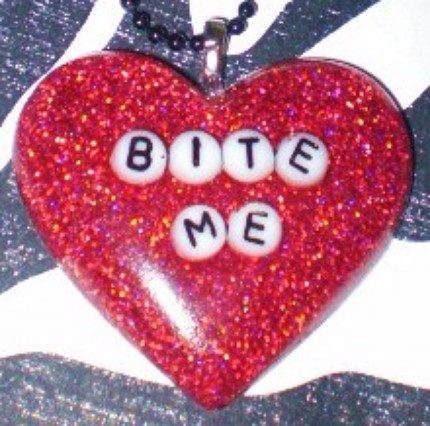 Bite me heart locket
