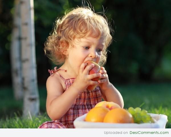 Baby Eating Apple