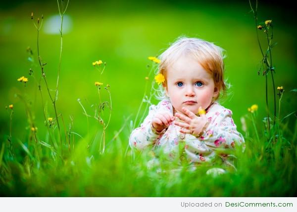 Baby Girl Sitting Grassland