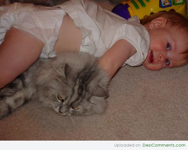 Baby Playing With Cat