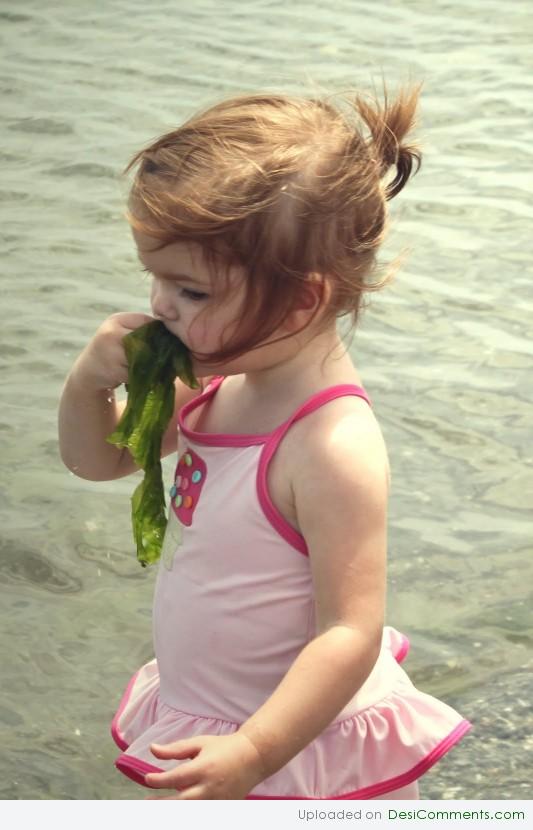 Girl Playing On Water