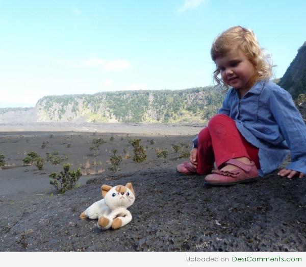 Girl Playing with Toy