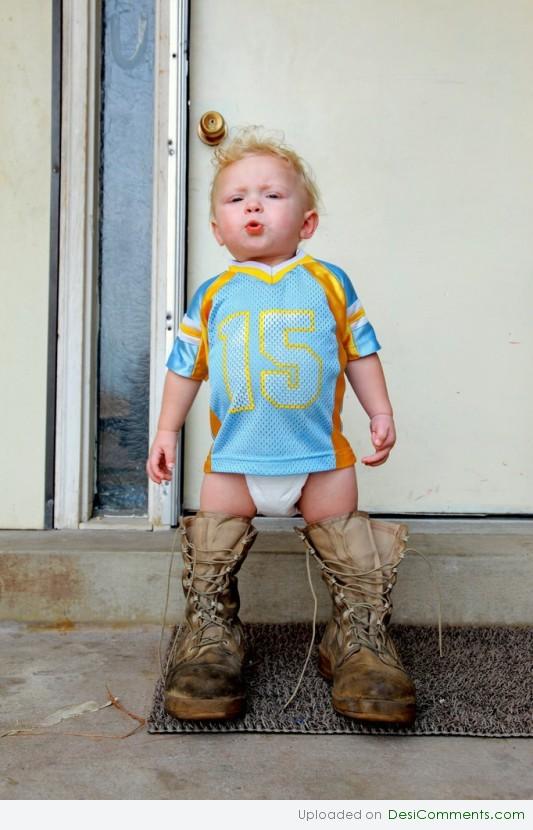 Baby Wearing A Long Shoes