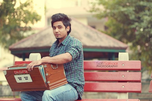 A Kay Playing harmonium