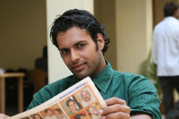 Aman Sutdhar Reading Newspaper