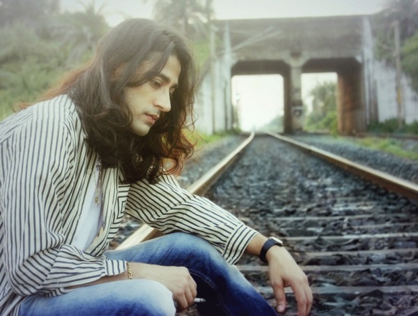 Rajkumar Patra smoking in lonely railroad