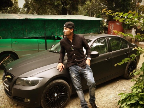 Garry Sandhu Posing With Car