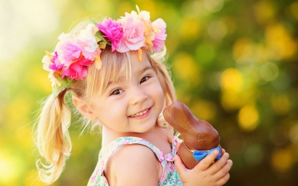 Little Girl With A Tiara Made Of Flowers