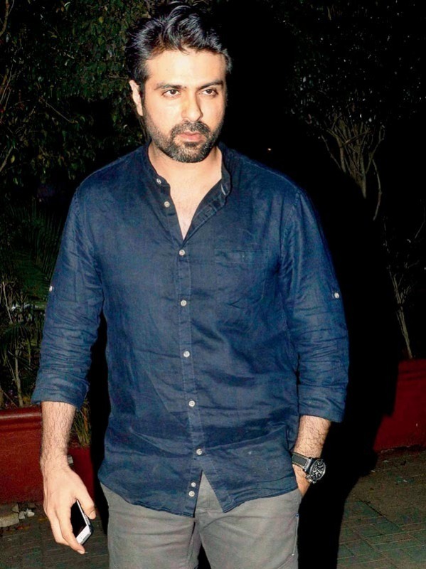 Harman Baweja Holding Phone