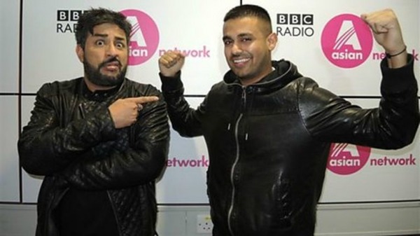 Jaz Dhami On Right side in Black Jacket