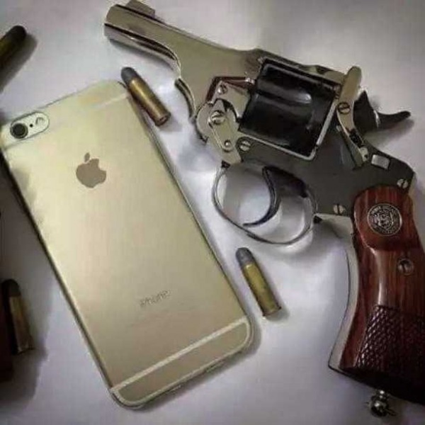 Apple I Phone And Revolver