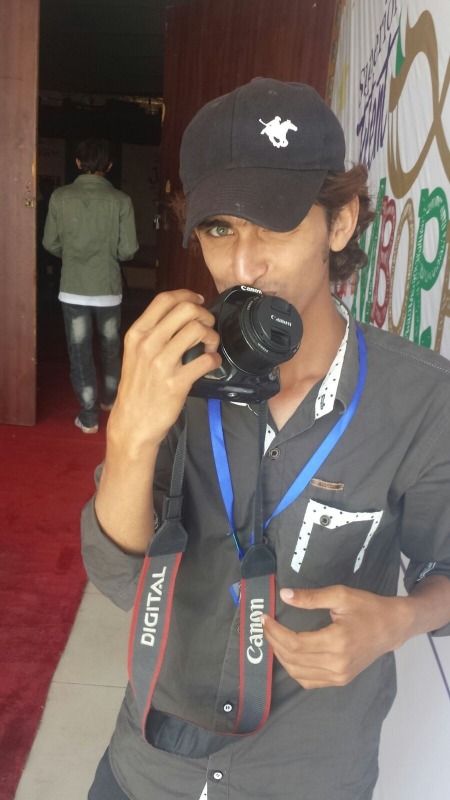 Haseeb Islam Karampur Holding Camera