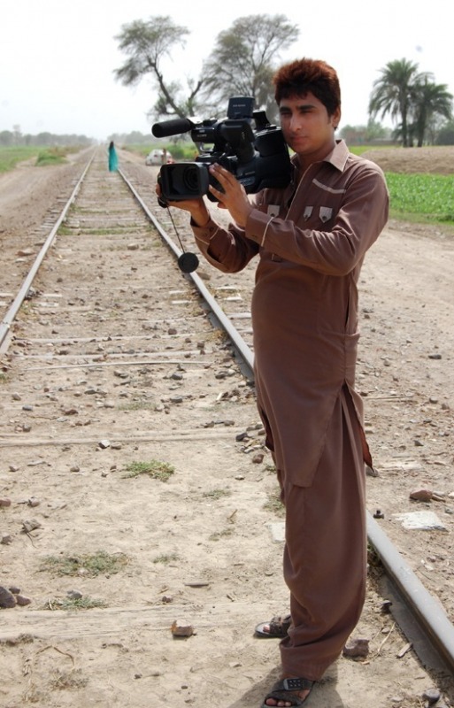 Aqeel Saghar Karampur Holding Camera