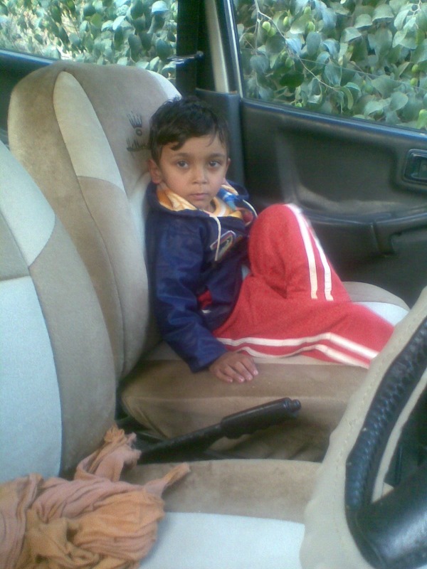 Kid In Car