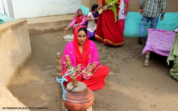 Woman Making Lassi (Drink Of Punjab)