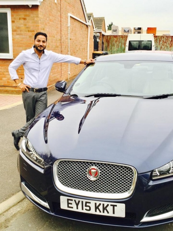 Director Amrinder Goraya with Jaguar in England uk