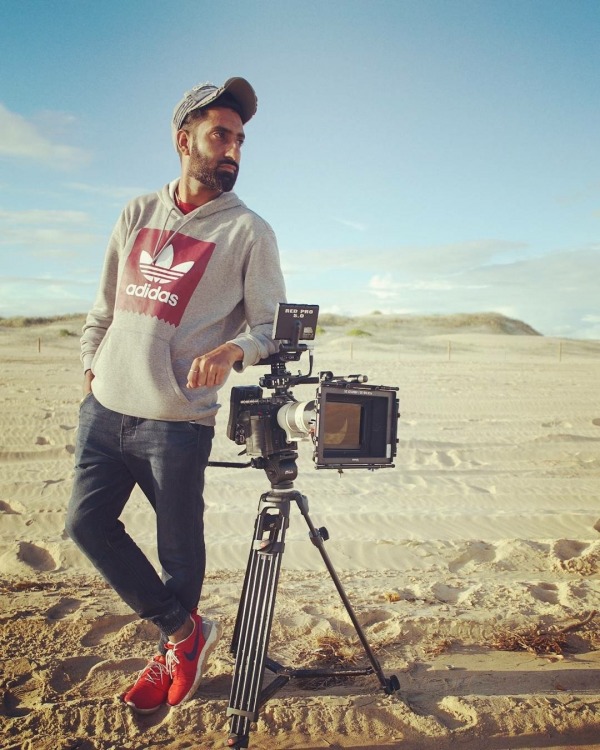 Dimpal Bhullar Posing With Camera