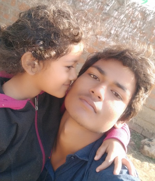 Sebu Ali Taking Selfie With Little Girl