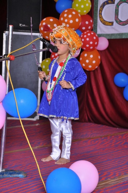 Cute Little Boy Performing In Fancy Dress Competition