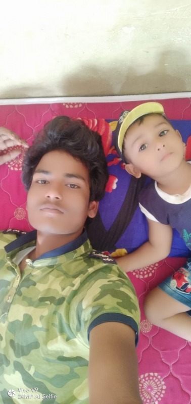 Sebu Ali Taking Selfie With Little Boy