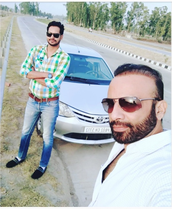 Vikki Surkhab Taking Selfie With His Friend
