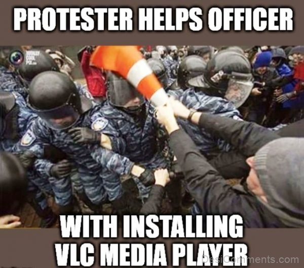 Protester Helps Officer