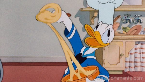 Donald Duck Holding Something pIcture