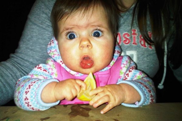 Baby Holding Lemon