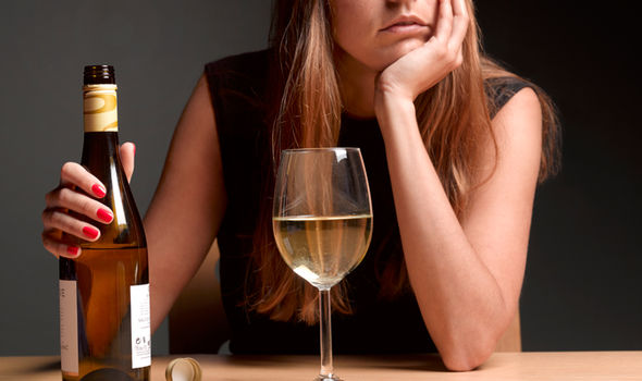 Girl Holding Wine Bottle