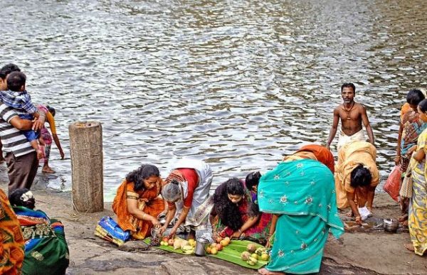 Ladies Doing Pray Near Pond