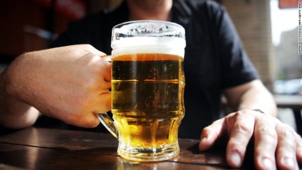 Man Holding Beer Glass