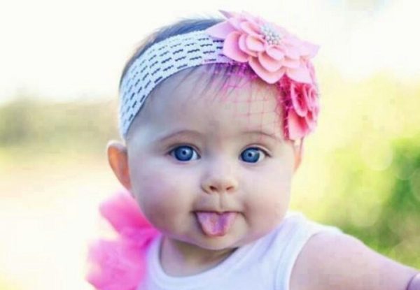 Cute Baby Girl With Flower Headband