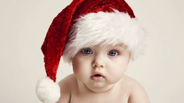 Cute Baby Wearing Santa Claus Cap Picture
