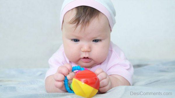 Baby Playing With Ball