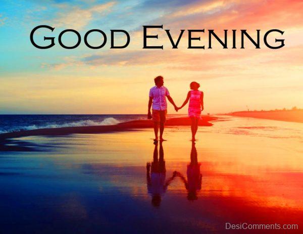 Good Evening Image with Couple Walking on the Beach