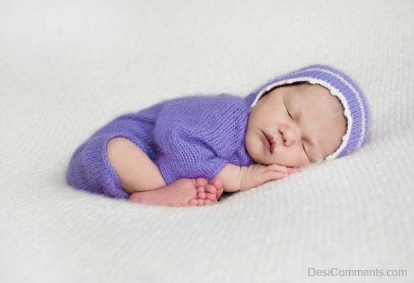 Baby Boy In Purple Onsie