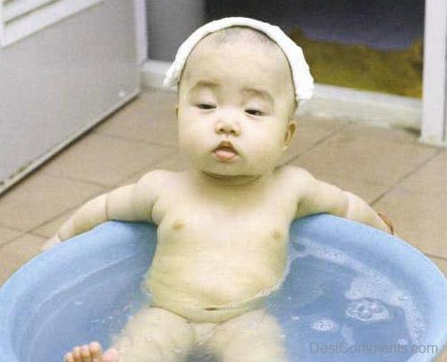 Baby Chilling In Bathing Tub