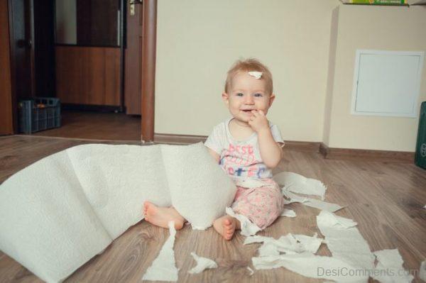 Baby Eating Paper
