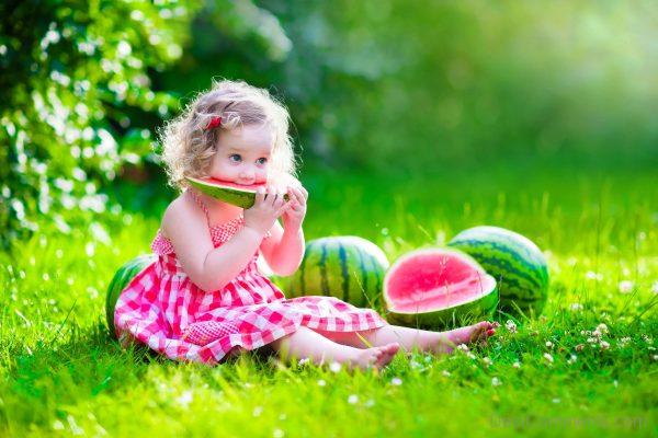 Baby Girl Eating Watermelon