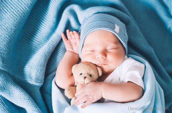 Baby Boy Sleeping With Teddy Bear