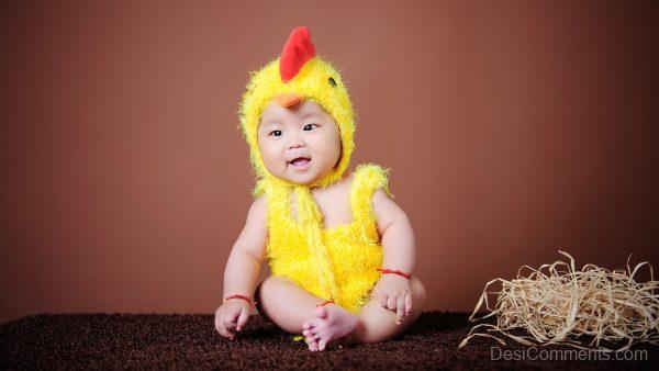 Baby Girl In Chicken Dress