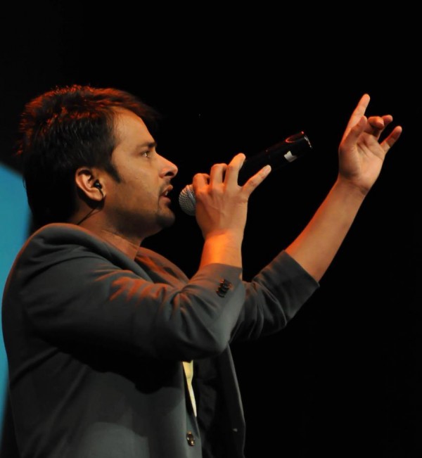 Amrinder gill Holding A Mike