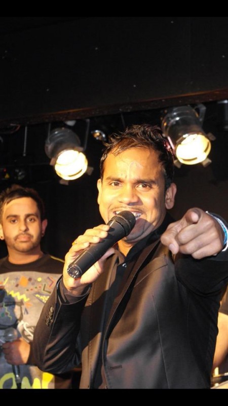 Angrej Ali Holding Mike