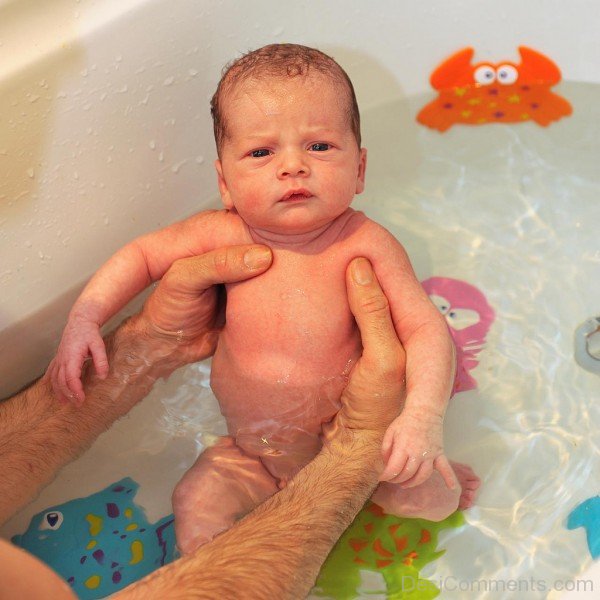 Baby Bathing In Tub
