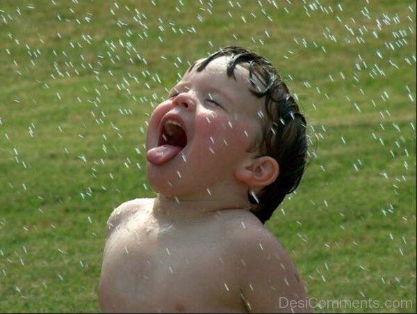 Baby Boy Enjoying Rain